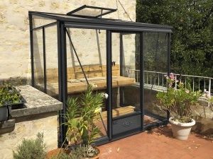 Serre en verre trempé adossée